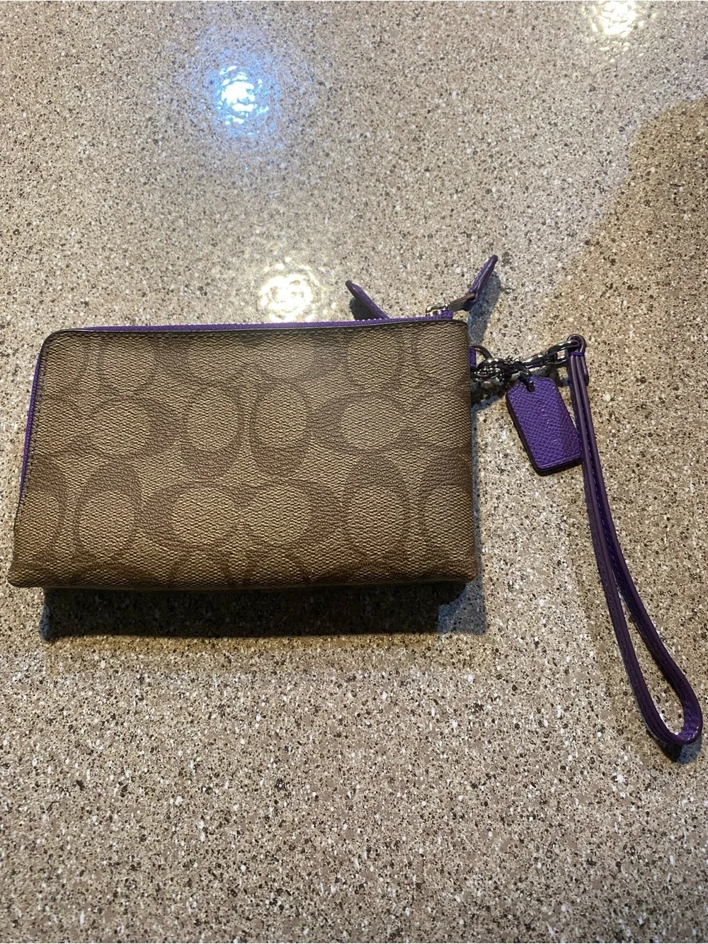 Coach Brown Signature Canvas Wristlet with Purple Trim